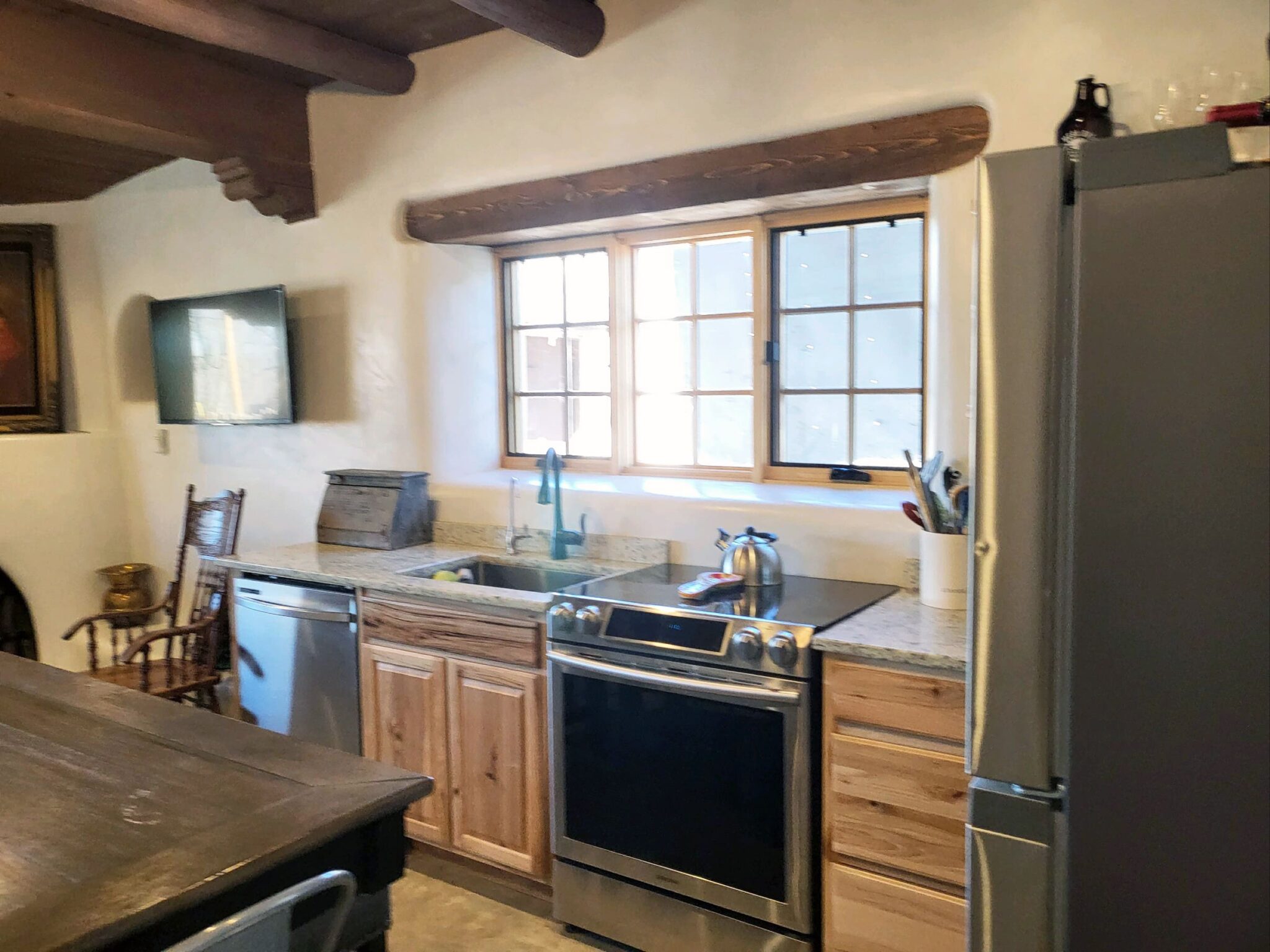 Kitchen Redesign, interior plaster, cabinetry. Taos, NM Handyman Services